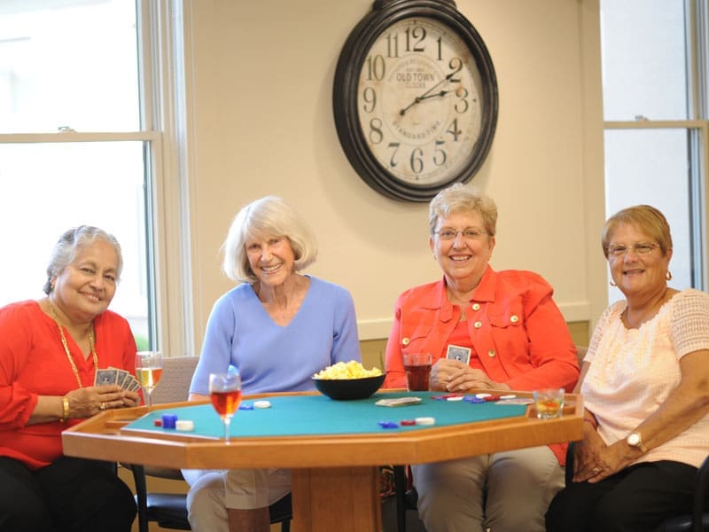 senior women playing poker
